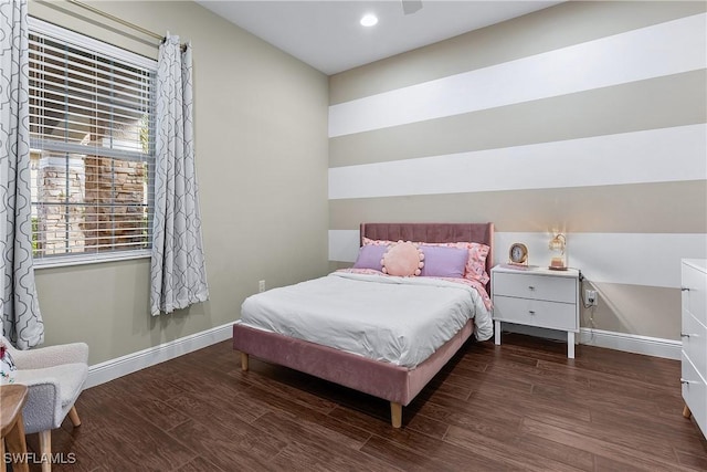 bedroom featuring dark hardwood / wood-style flooring