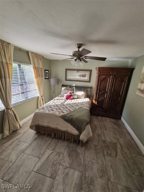 bedroom featuring ceiling fan