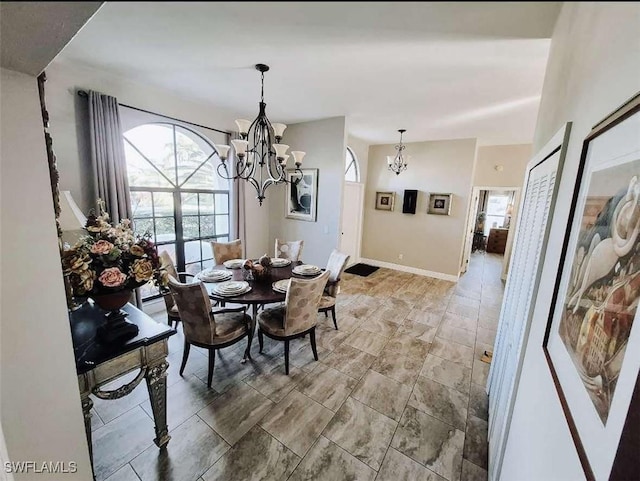 dining room featuring a notable chandelier