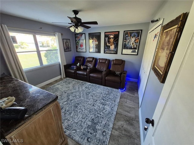 living room featuring ceiling fan