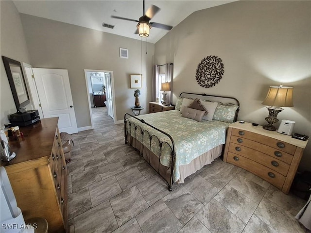 bedroom featuring ceiling fan and high vaulted ceiling