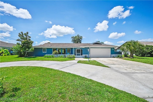 ranch-style house with a garage and a front lawn