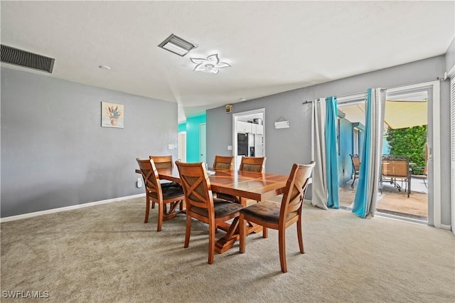 view of carpeted dining room