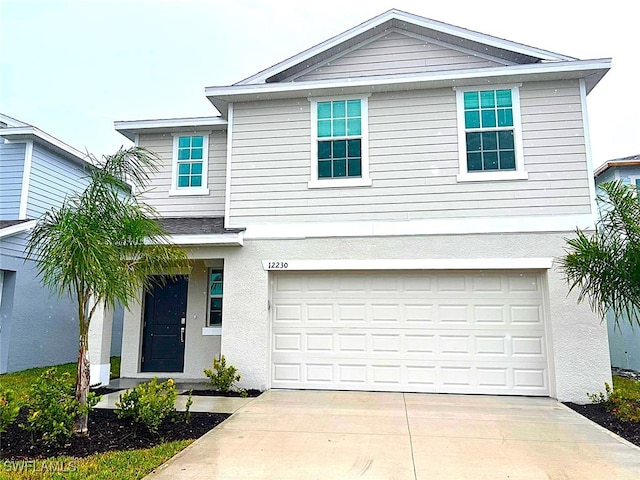 view of front of house with a garage