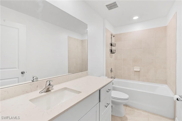 12230 Dakota Ridge Pl, Lehigh Acres, FL 33974 - bathroom featuring vanity, toilet, tile patterned flooring,  shower combination, and recessed lighting