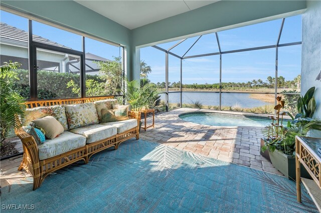 view of swimming pool with a water view