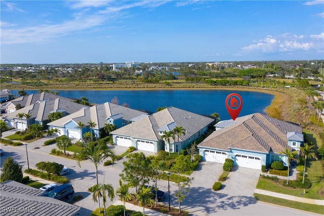 aerial view with a water view and a residential view