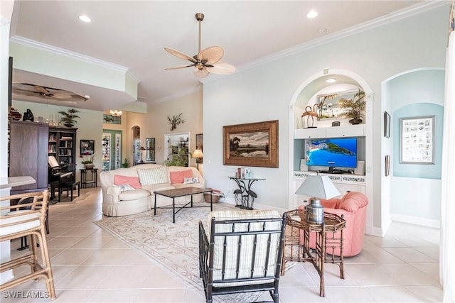 tiled living room featuring crown molding and ceiling fan