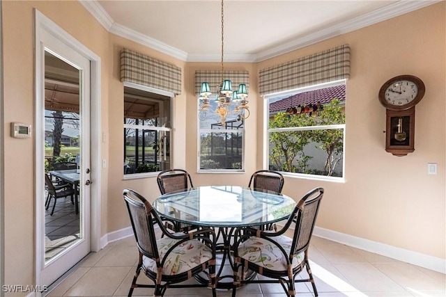 tiled dining area featuring ornamental molding, a chandelier, and a healthy amount of sunlight