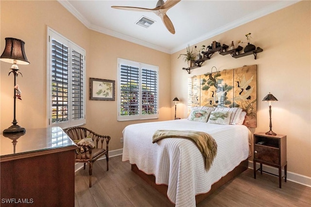 bedroom with ceiling fan, ornamental molding, and dark hardwood / wood-style flooring