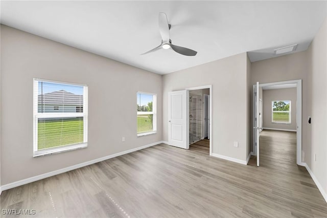 unfurnished bedroom featuring ceiling fan and light wood-type flooring