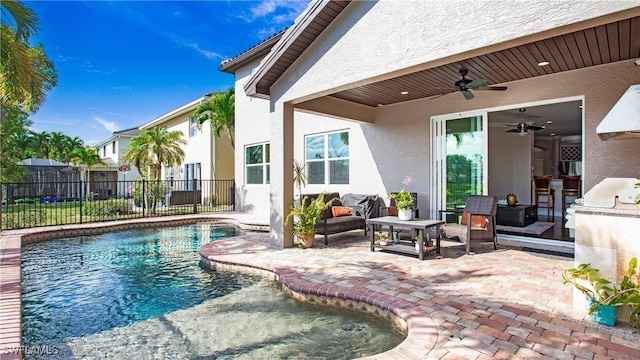 view of pool featuring a patio, fence, an outdoor living space, and ceiling fan