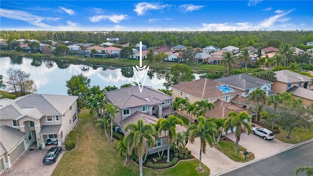 aerial view with a residential view and a water view