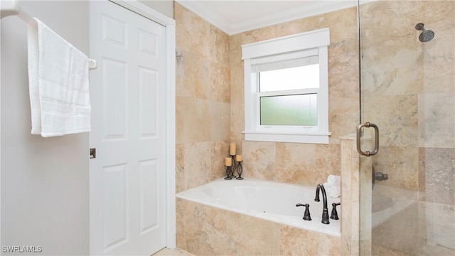 full bathroom with a bath, a shower stall, and crown molding