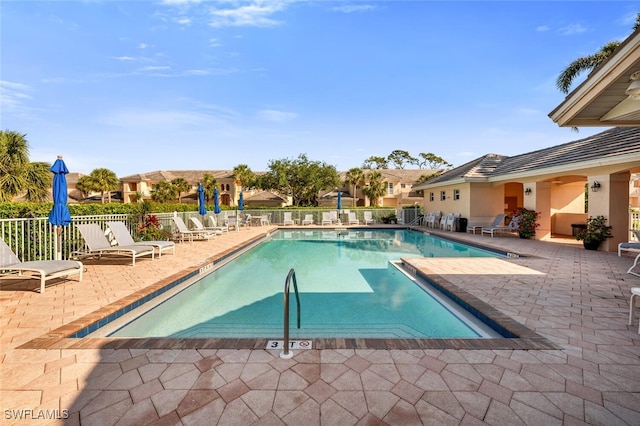 view of pool featuring a patio