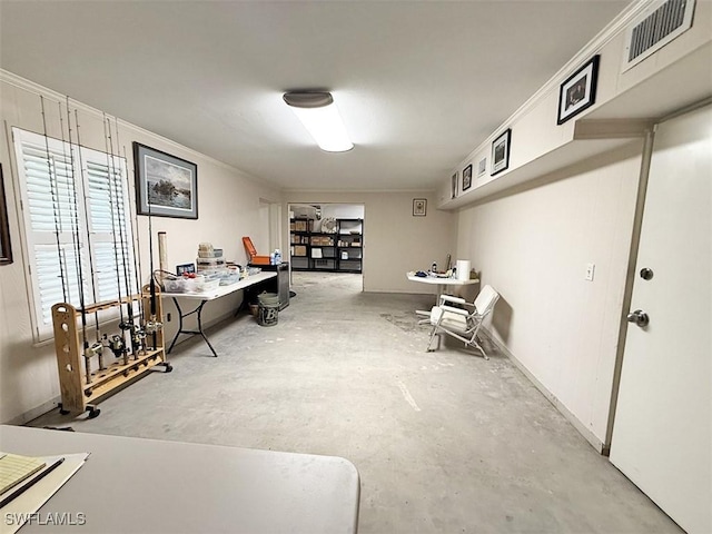 office area with crown molding and concrete flooring