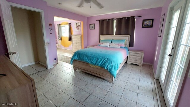 bedroom featuring light tile patterned flooring and ceiling fan