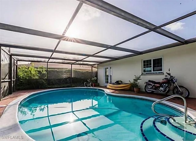 view of pool with a lanai