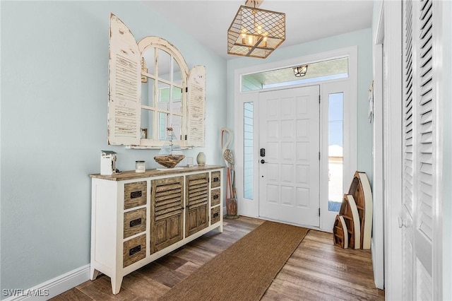 foyer with hardwood / wood-style flooring