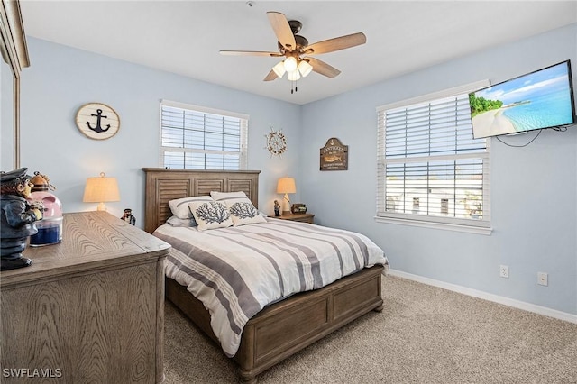 bedroom with light colored carpet and ceiling fan