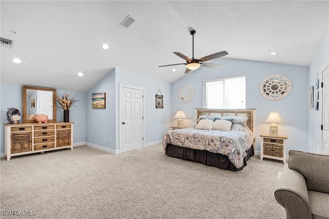 bedroom featuring ceiling fan, vaulted ceiling, and carpet