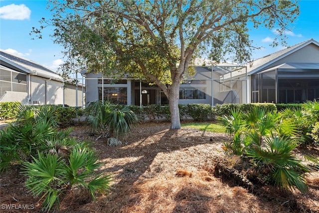 view of yard with a lanai