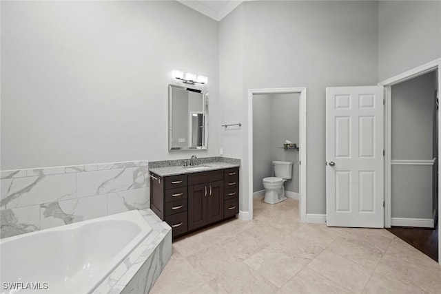 bathroom with a high ceiling, vanity, a relaxing tiled tub, and toilet