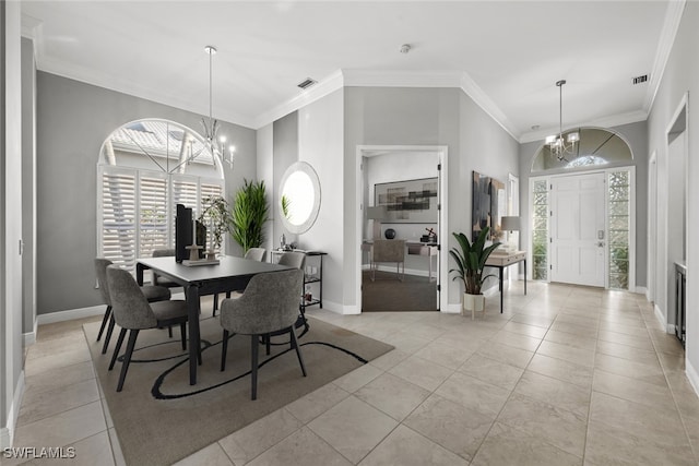 dining space featuring an inviting chandelier, light tile patterned floors, and ornamental molding