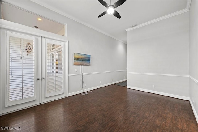 empty room featuring ornamental molding, dark hardwood / wood-style floors, and ceiling fan