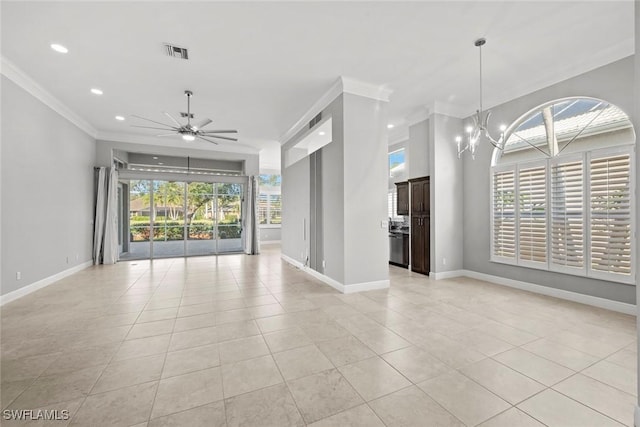 tiled empty room featuring ceiling fan with notable chandelier, plenty of natural light, and ornamental molding