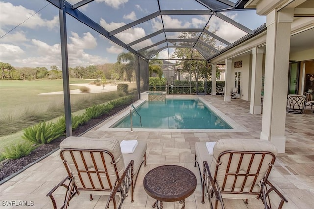 view of pool with a patio and a lanai