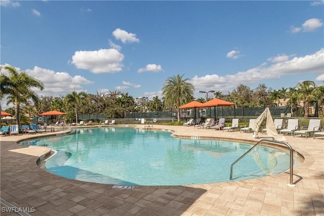 view of swimming pool featuring a gazebo and a patio