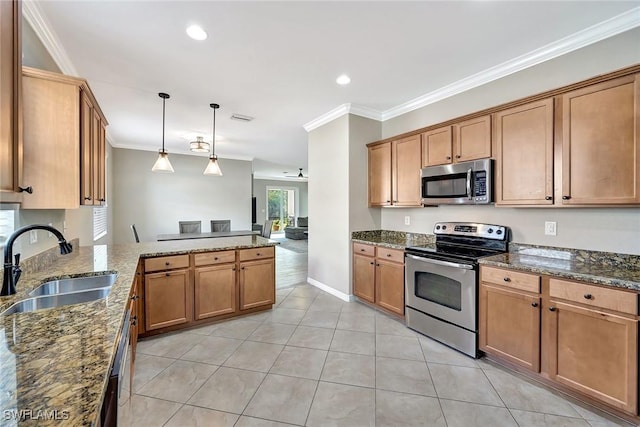 kitchen featuring appliances with stainless steel finishes, pendant lighting, sink, ornamental molding, and kitchen peninsula