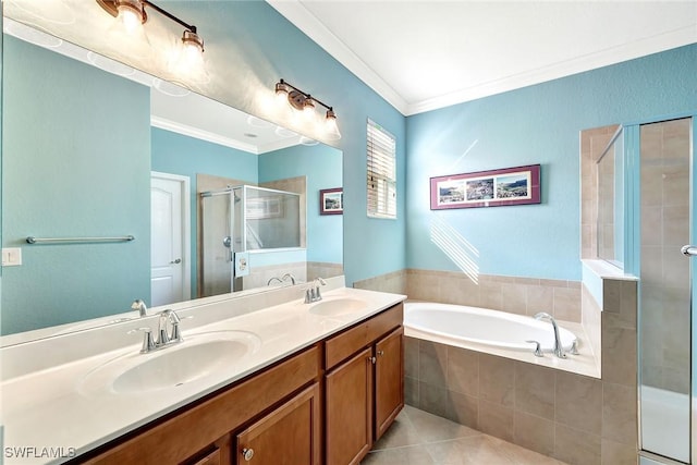 bathroom featuring vanity, crown molding, tile patterned floors, and shower with separate bathtub