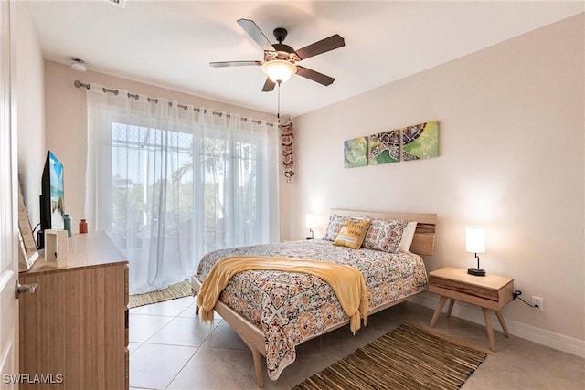 bedroom featuring ceiling fan and light tile patterned flooring