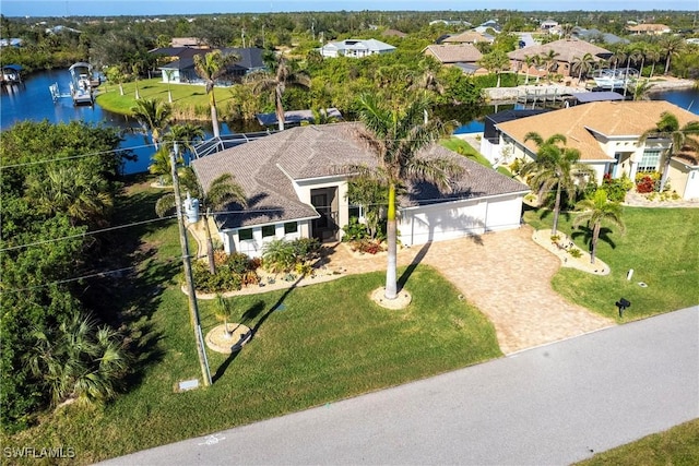 birds eye view of property featuring a water view