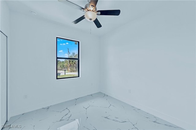 spare room featuring ceiling fan