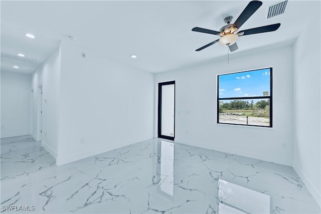 empty room featuring ceiling fan