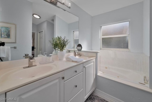 bathroom featuring vanity and a bathing tub