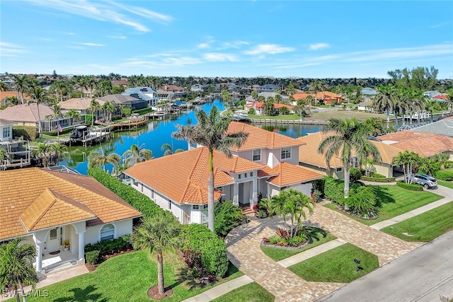 drone / aerial view with a water view