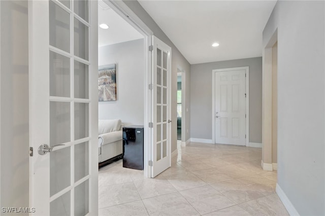 hall featuring french doors