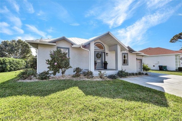 ranch-style home with a front yard