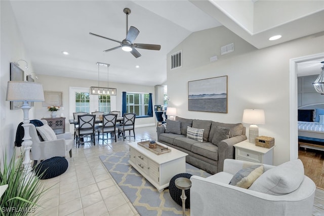 1533 San Marco Rd, Marco Island, FL 34145 - living area with light tile patterned floors, recessed lighting, ceiling fan with notable chandelier, and visible vents
