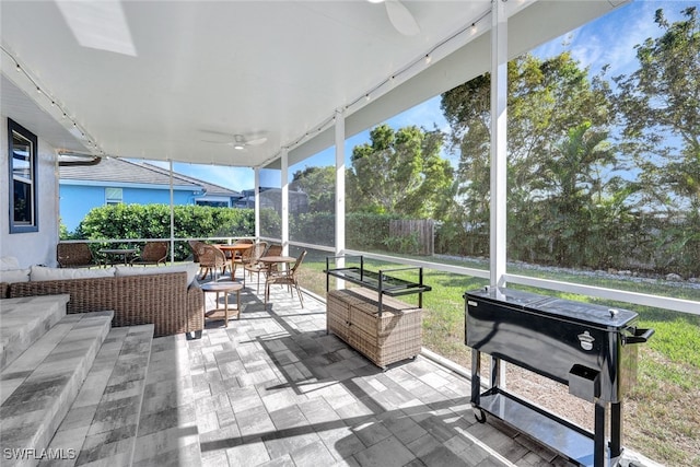 1533 San Marco Rd, Marco Island, FL 34145 - sunroom / solarium with outdoor lounge area, outdoor dining space, and a ceiling fan