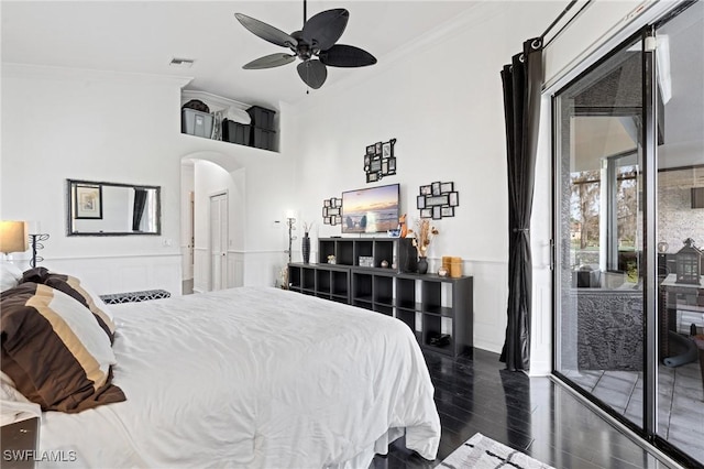 bedroom with access to outside, ornamental molding, dark hardwood / wood-style floors, and ceiling fan