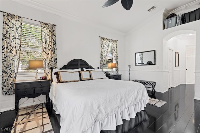 bedroom with crown molding and ceiling fan