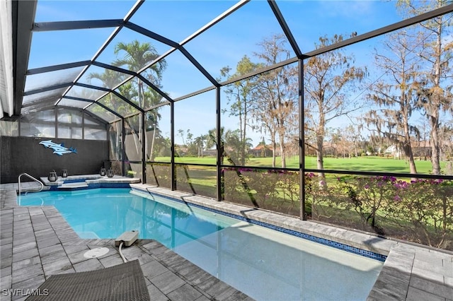 view of pool featuring an in ground hot tub, a patio area, and glass enclosure