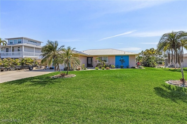 view of front of home with a front yard