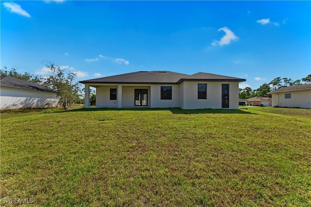 view of front of home with a front yard