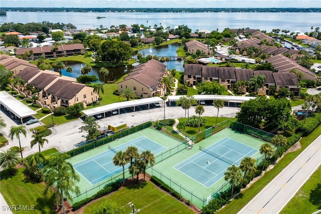 drone / aerial view with a water view